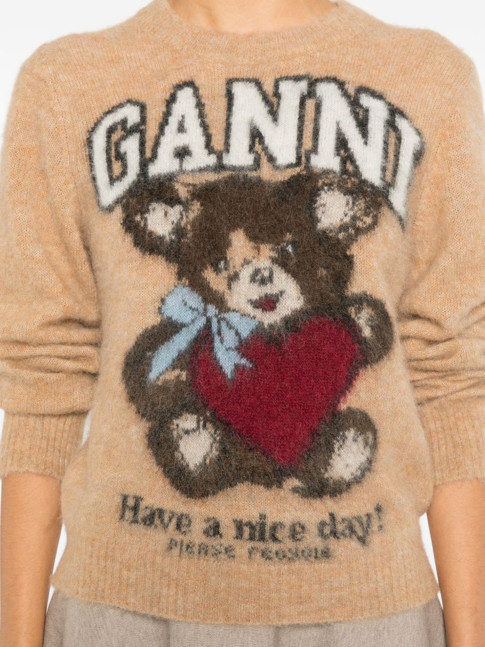 GANNI – Pull en laine jacquard camel à motif